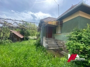 Vand  casa cu teren de 1062mp/13.41ml situata in satul Vale 